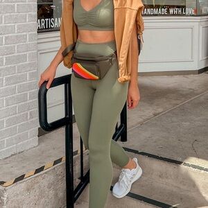 Bagging Rights Belt Bag - olive green with pink, orange, and chartreuse stripe.